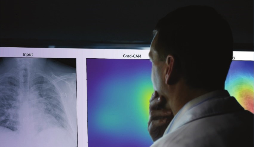 Physician looking at screens