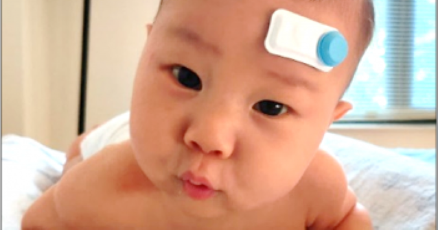 infant wearing a wireless device