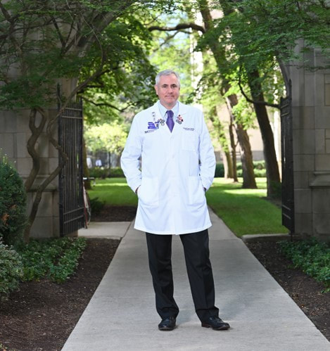Photo of Dr. Donald Lloyd-Jones standing outside