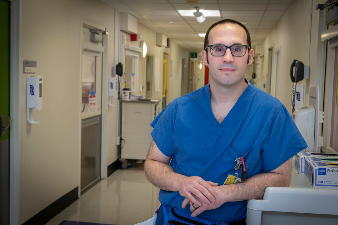 Brian Garibaldi, MD, MEHP in scrubs