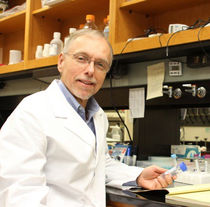 ​Robert Vassar, PhD posing in lab