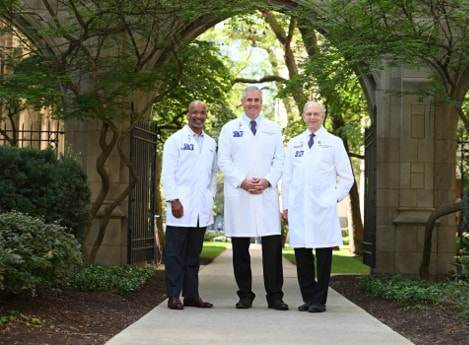 Photo of Dr. Clyde Yancy, Dr. Donald Lloyd-Jones and Dr. Robert Bonow standing outside